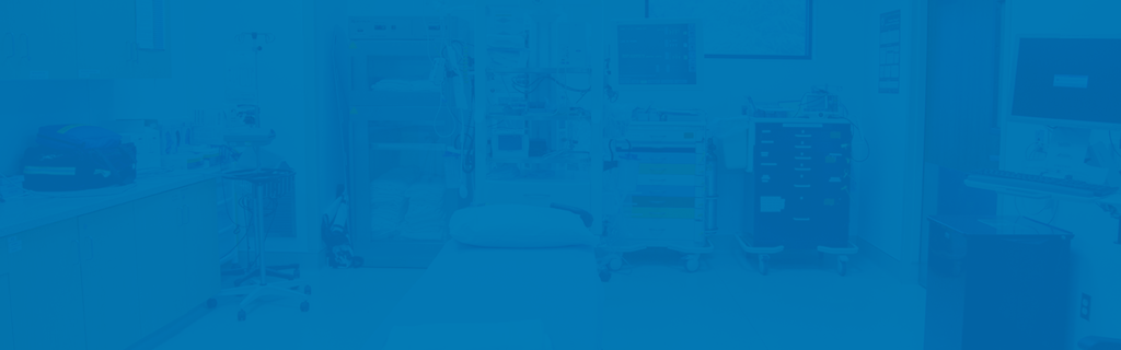 Blue-tinted image of a medical room.